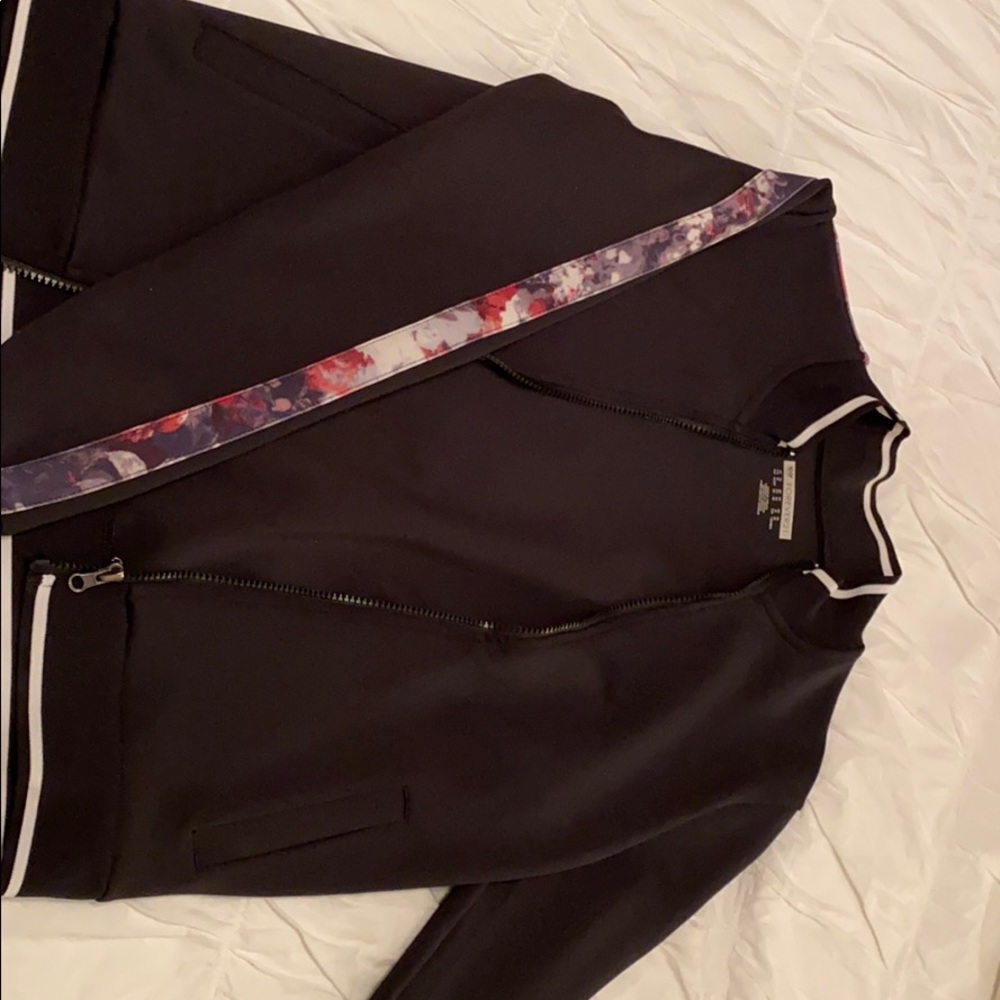 black bomber jacket with flower details